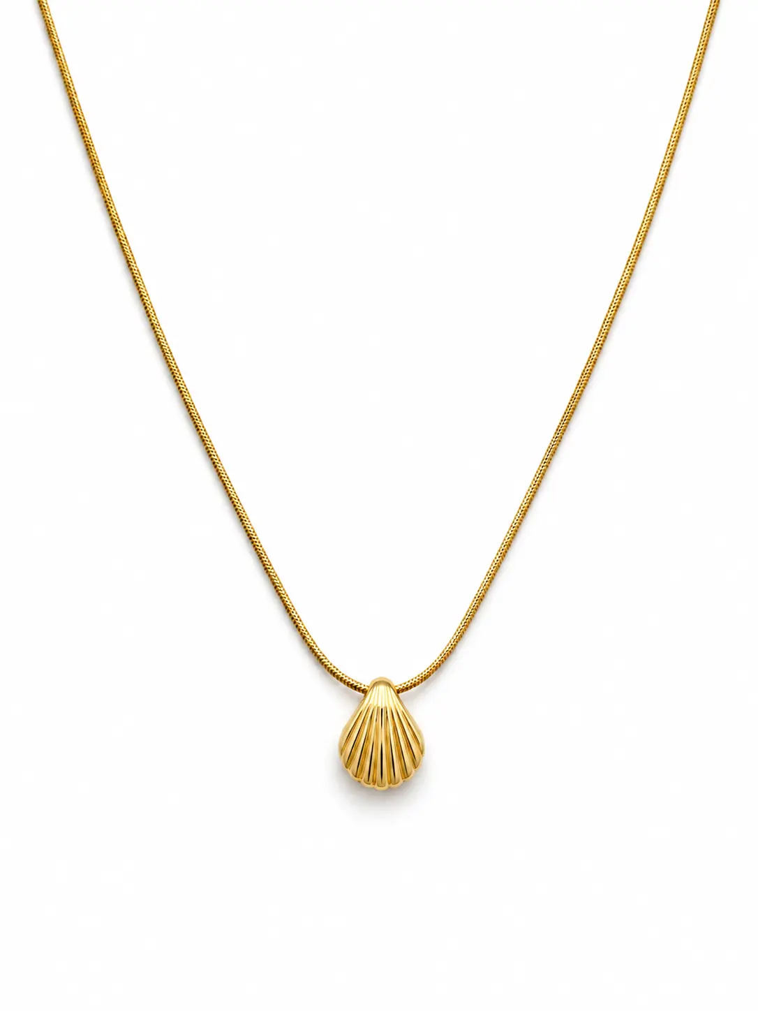 Gold necklace with sculpted shell pendant